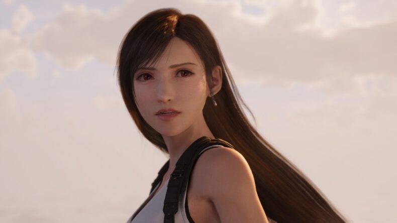 Uma imagem aproximada de Tifa Lockhart, do jogo 'Final Fantasy VII Remake', olhando para longe diante de um céu nublado.