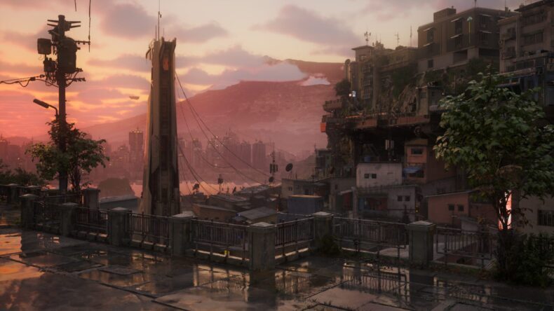 Uma paisagem urbana ao pôr do sol no jogo Cyberpunk 2077: Phantom Liberty, mostrando uma arquitetura detalhada e montanhas no horizonte.